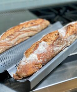 Chicago Metallic Commercial II Non-Stick Perforated Baguette Pan. Creates a crisp, golden-brown crust, 16 L x 9 W x 1.5 H 38 71rxvLWgPqL