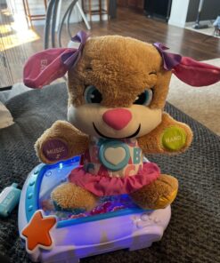 Fisher-Price Laugh & Learn Baby & Toddler Toy Smart Stages Sis With Pink Skirt and Purple Bows, Interactive Plush Dog with Music Lights & Learning Content for Ages 6+ Months Sis - Pink 56 71tBu81kedL