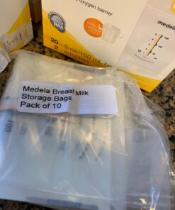 Medela Pump & Save Breast Milk Storage Bags, 20 Count Pack, Breastmilk Freezer Bags, Pour or Pump Directly into Bags with Included Easy Connect Adaptors, Made Without BPA 22 Count (Pack of 1) 15 71wJqKtHZcL