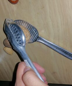 Magic Nutcracker Tool Works in Seconds. No Mess. Works on Walnuts, Almonds, Pecans, Hazelnuts. Great to Use As a Lemon Lime Squeezer. 64 71wU0cLVVGL