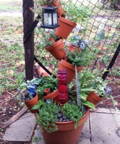 Modern Innovations Ceramic Terracotta Self Watering Spikes (4 Pack) Vacation Automatic Plant Waterer Devices, Indoor/Outdoor Planter Insert, Terra-Cotta Stakes for Potted Plants, Auto-Water System 4 Pack 40 71wURxwzknL