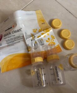 Medela Breast Milk Storage Bottles, 3 Pack of 5 Ounce Breastfeeding Bottles with Slow Flow Nipples, Lids, Wide Base Collars, and Travel Caps, Made Without BPA 3 Count (Pack of 1) 39 71xAXbNi kL