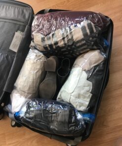 RoomierLife 8 Travel Space Saver Bags. Pack of 8 Bags, size Medium to Large. Roll-Up Compression Storage (No Vacuum Needed) & Packing Organizers. Perfect for Travel and Home Storage Travel Space Bags 36 71xQmOSQ3L 1