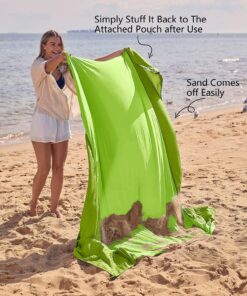 WEKAPO Beach Blanket Sandproof, Extra Large Beach Mat, Big & Compact Sand Free Mat Quick Drying, Lightweight & Durable with 6 Stakes & 4 Corner Pockets Green 9x10 FT (1~8 person) 16 811E4VrgjRL