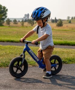 Strider 12” Classic Bike - No Pedal Balance Bicycle for Kids 18 Months to 3 Years - Includes Built-In Footrest, Handlebar Grips & Flat-Free Tires N 22 811poEKOnKL