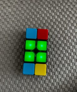 Flipslide Game - Electronic Handheld Game | Addictive Multiplayer Puzzle Game of Skill | Flip, Slide & Match Colors to Beat the Clock | 4 Thrilling Game Modes | Ages 8+ | Includes Batteries 37 812GyH5eRVL