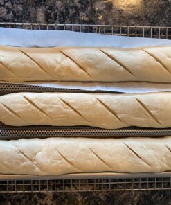 Chicago Metallic Commercial II Non-Stick Perforated Baguette Pan. Creates a crisp, golden-brown crust, 16 L x 9 W x 1.5 H 32 816QdvGxt L