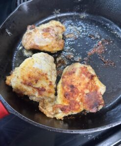 Lodge Cast Iron Skillet with Red Silicone Hot Handle Holder, 12-inch 45 81BkCj75XL