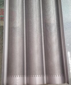 Chicago Metallic Commercial II Non-Stick Perforated Baguette Pan. Creates a crisp, golden-brown crust, 16 L x 9 W x 1.5 H 27 81Cb6Zg7iIL