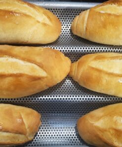 Chicago Metallic Commercial II Non-Stick Perforated Baguette Pan. Creates a crisp, golden-brown crust, 16 L x 9 W x 1.5 H 34 81GJbEw 3EL