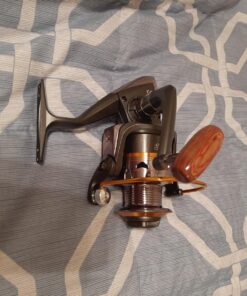 Sougayilang Spinning Fishing Reels with Left/Right Interchangeable Collapsible Wood Handle Powerful Metal Body 5.2:1/5.1:1 Gear Ratio Smooth 11BB for Inshore Boat Rock Freshwater Saltwater Fishing DK3000 34 81bMB8LVv9L