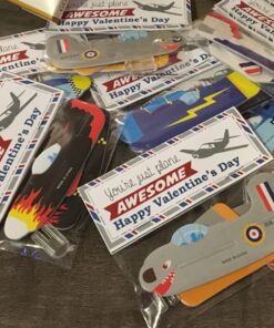 Neliblu Bulk Pack of 72 Airplane Gliders Party Favors for Kids - Party Pack Individually Wrapped Flying Paper Planes – Assorted Designs - for Rewards and Prizes, Pinata Fillers, Carnival Prizes 29 81dtjYNHhiL