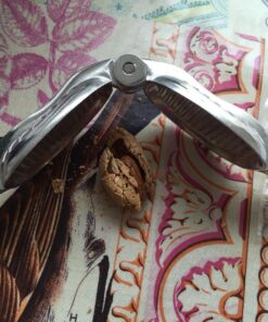 Magic Nutcracker Tool Works in Seconds. No Mess. Works on Walnuts, Almonds, Pecans, Hazelnuts. Great to Use As a Lemon Lime Squeezer. 51 81h5E9RSw3L