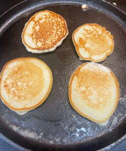 Lodge Cast Iron Round Griddle with Red Silicone Hot Handle Holder, 10.5-inch Round Griddle Bundle 32 81hY92oYjZL