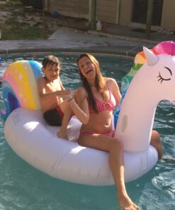 dreambuilderToy Giant Inflatable Unicorn Pool Float, 9 Feet Long , Unicorn Pool Float Floatie Ride On Large raft Summer Beach Pool Party Lounge for Kids and Adults (Unicorn Float) 28 81hjJ133LCL