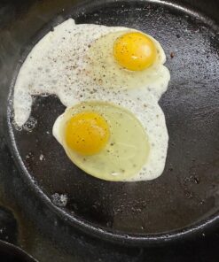 Lodge Cast Iron Skillet with Red Silicone Hot Handle Holder, 12-inch 49 81rz4PI0TUL