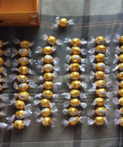 Lindt LINDOR Caramel Milk Chocolate Truffles, Milk Chocolate Candy with Smooth, Melting Truffle Center, Great for gift giving, 25.4 oz., 60 Count 60 Count (Pack of 1) 31 81st3 SiXJL 1