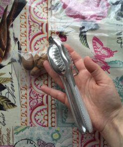 Magic Nutcracker Tool Works in Seconds. No Mess. Works on Walnuts, Almonds, Pecans, Hazelnuts. Great to Use As a Lemon Lime Squeezer. 52 81wnXX0z4eL