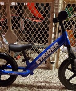 Strider 12” Classic Bike - No Pedal Balance Bicycle for Kids 18 Months to 3 Years - Includes Built-In Footrest, Handlebar Grips & Flat-Free Tires N 32 81xHvPr86zL