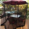 Patio Umbrella Mosquito Netting - Polyester Mesh Screen with Zipper Opening and Water Tube at Base to Hold in Place - Helps Protect from Mosquitoes - Fits 9FT Umbrellas and Patio Tables - Black