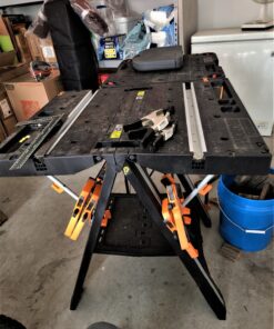 Worx Pegasus 2-in-1 Folding Work Table & Sawhorse, Easy Setup Portable Workbench, 31" W x 25" D x 32" H Lightweight Worktable with Heavy-Duty Load Capacity, WX051 - Includes 2 Clamps & 4 Clamp Dogs Worx Pegasus Work Table 58 91G0ycOd0qL