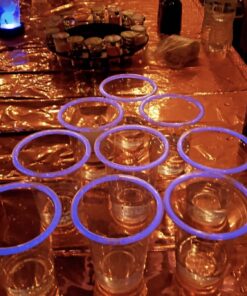 GLOWPONG Green vs Blue Glow in The Dark Beer Pong Game Set for Indoor Outdoor Nighttime Competitive Fun, 12 Green vs 12 Blue Glowing Cups, 4 Glowing Balls, 1 Ball Charging Unit Makes Every Shot Glow 21 91cRx 9lQ9L