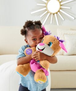 Fisher-Price Laugh & Learn Baby & Toddler Toy Smart Stages Sis With Pink Skirt and Purple Bows, Interactive Plush Dog with Music Lights & Learning Content for Ages 6+ Months Sis - Pink 43 91tPhVxheLL