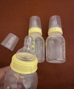 Medela Breast Milk Storage Bottles, 3 Pack of 5 Ounce Breastfeeding Bottles with Slow Flow Nipples, Lids, Wide Base Collars, and Travel Caps, Made Without BPA 3 Count (Pack of 1) 27 B1pb5ck83S