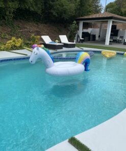 dreambuilderToy Giant Inflatable Unicorn Pool Float, 9 Feet Long , Unicorn Pool Float Floatie Ride On Large raft Summer Beach Pool Party Lounge for Kids and Adults (Unicorn Float) 23 C10nZjnbu2S