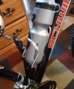 Schwinn Bike Bottle Holder With Water Bottle, 23 Oz. BPA-Free Squeeze Sport Bottle and Durable Alloy Cage, Easy To Mount Cycling Accessory 23 Ounces 47 C1zJAyoJfES